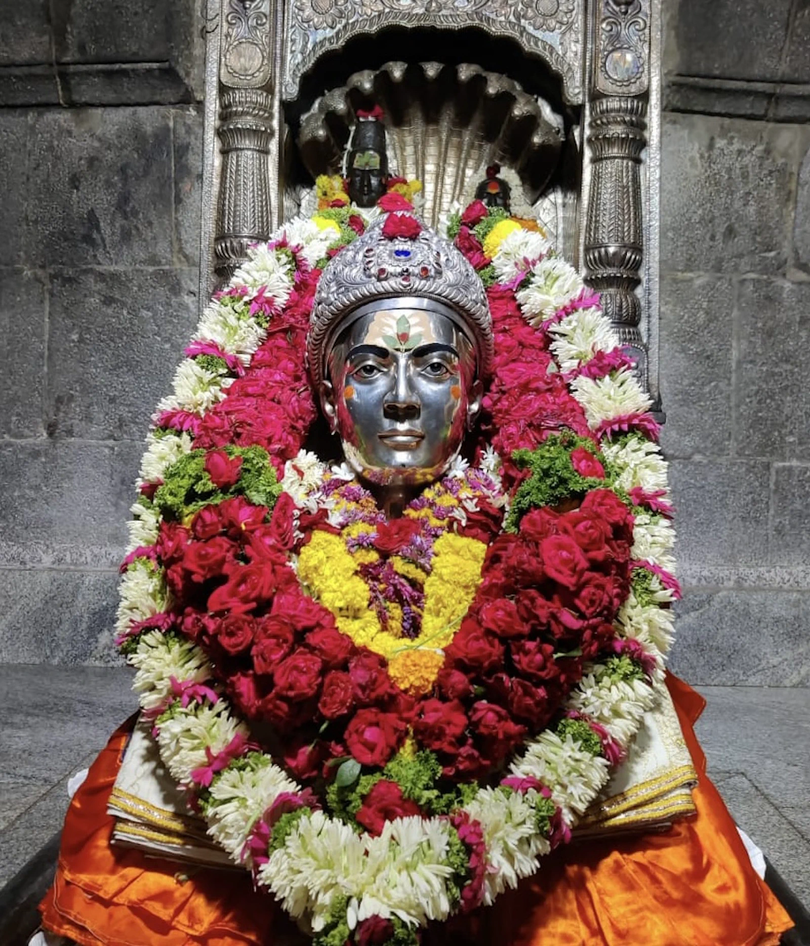 Mauli shrine adorned with flowers