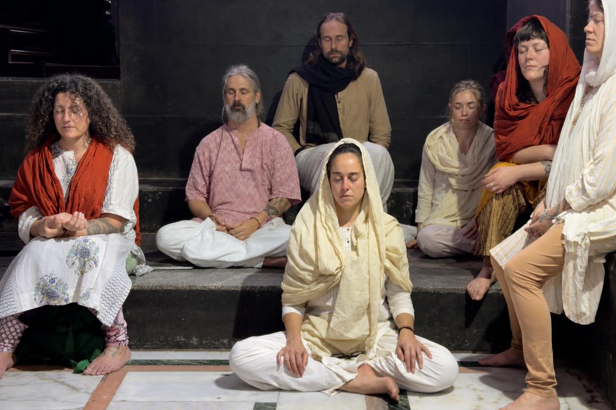 A group meditating together on retreat